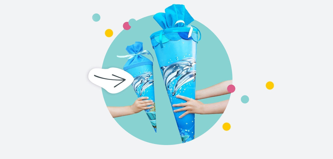 Titelbild zum Magazinbeitrag "Was kommt in die Schultüte?" - DasBild zeigt zwei blaue Schultüten mit Delfinen. Eine große und eine kleine Geschwistertüte.